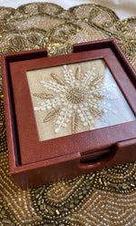 Load image into Gallery viewer, Handcrafted Chikankari Tea Coaster Set with Wooden Holder – Set of 6 - HONC0310084