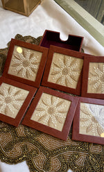 Load image into Gallery viewer, Handcrafted Chikankari Tea Coaster Set with Wooden Holder – Set of 6 - HONC0310084