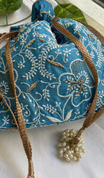 Load image into Gallery viewer, Green Chikankari Embroidered Potli Bag with Golden Bead Tassels - HONC0316098