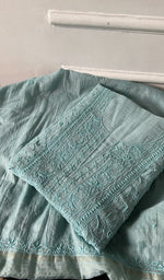 Load image into Gallery viewer, aqua chikankari set folded, worked panel on top