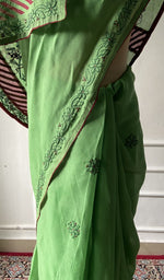 Load image into Gallery viewer, Green saree draped to show the fall of the fabric