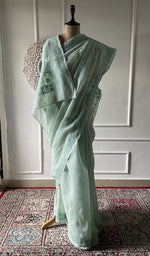 Load image into Gallery viewer, Sea green cotton voile chikankari saree draped on the mannequin