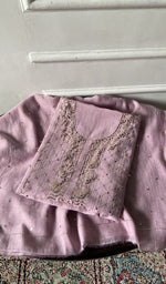 Load image into Gallery viewer, The lilac pieces folded and stacked