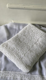 Load image into Gallery viewer, white chikankari set folded, worked panel on top