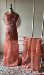 Load image into Gallery viewer, Rust organza chikankari suit set on the mannequin, dupatta alongside