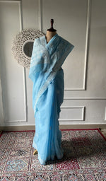 将图像加载到图库查看器中, Powder blue cotton voile chikankari saree draped on the mannequin