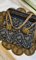 Load image into Gallery viewer, Black Chikankari Embroidered Potli Bag with Golden Bead Tassels - HONC0317191
