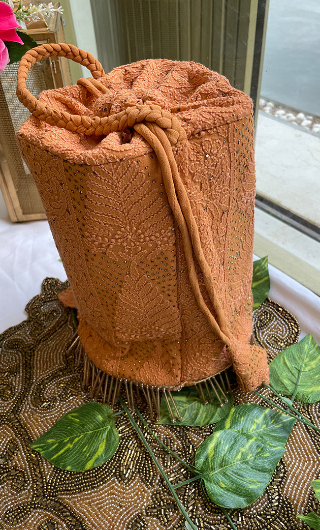 Handcrafted Mustard Chikankari Potli Clutch Bag with Mukaish work - HONC060107