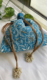 Load image into Gallery viewer, Green Chikankari Embroidered Potli Bag with Golden Bead Tassels - HONC0316098