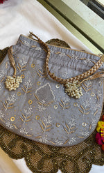 Load image into Gallery viewer, Grey Chikankari Embroidered Potli Bag with White Bead Tassels - HONC0317190
