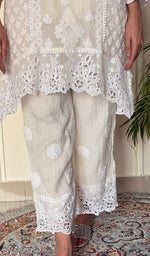 Women's Lucknowi Handcrafted Mul Chanderi Stitched Chikankari Short Kurta And Plazzo Set . (Copy)