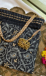 Load image into Gallery viewer, Black Chikankari Embroidered Potli Bag with Golden Bead Tassels - HONC0317191
