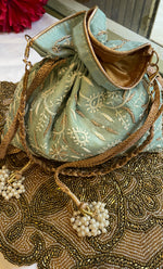Load image into Gallery viewer, Green Chikankari Embroidered Potli Bag with White Bead Tassels - HONC0317196
