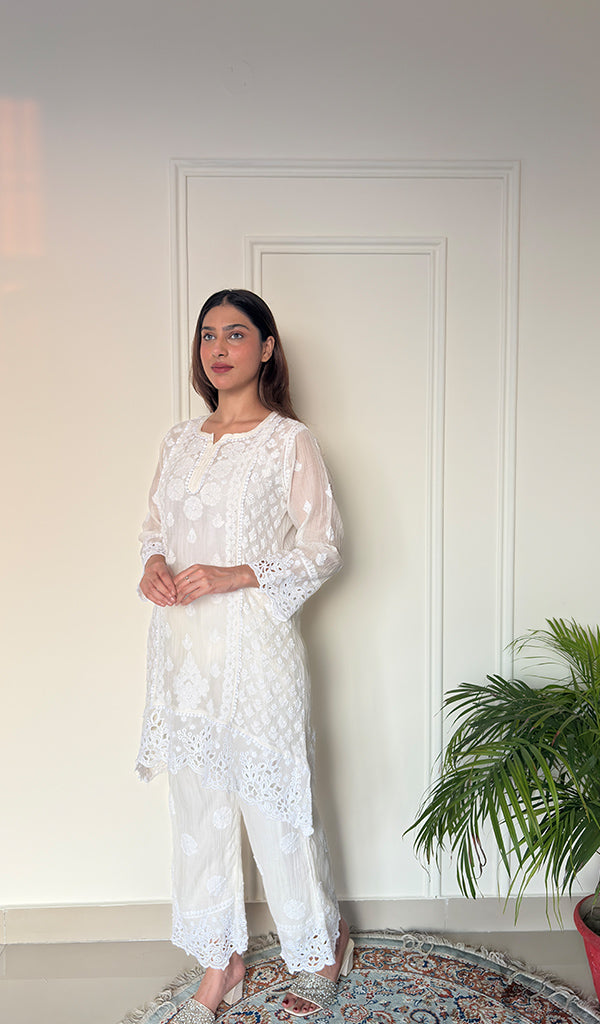 Women's Lucknowi Handcrafted Mul Chanderi Stitched Chikankari Short Kurta And Plazzo Set . (Copy)