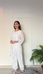 Women's Lucknowi Handcrafted Mul Chanderi Stitched Chikankari Short Kurta And Plazzo Set . (Copy)