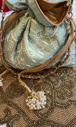 Load image into Gallery viewer, Green Chikankari Embroidered Potli Bag with White Bead Tassels - HONC0317196
