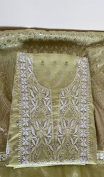 Green pure mul chanderi kurta piece folded, fine chikankari with allover banarasi dupatta
