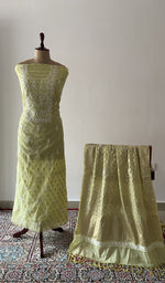 The set on the mannequin with its dupatta beside it