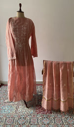 The set on the mannequin with its dupatta beside it