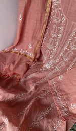 Motifs across the body of the peach kurta