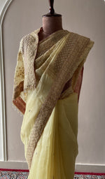 Lemon yellow organza silk saree, lower half