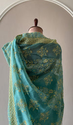 Teal organza silk saree, detail view