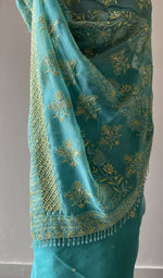 Hand embroidery on the saree, close view