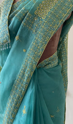 Teal organza silk saree, lower half