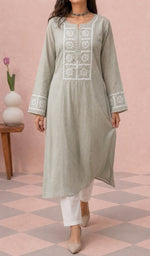 Khaki kurti from the front, styled with a white pant