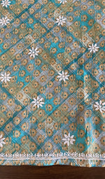 Hand embroidery on teal mul cotton