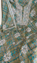 Teal mul cotton laid flat on the table