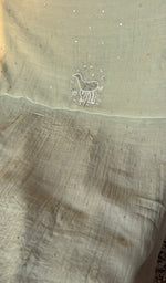 Hand embroidery on sage green mul chanderi