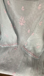 Hem and border of the blue dupatta