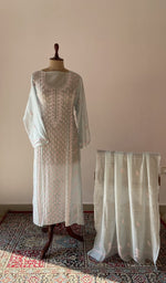 Blue pure mul chanderi chikankari suit set on the mannequin with its dupatta