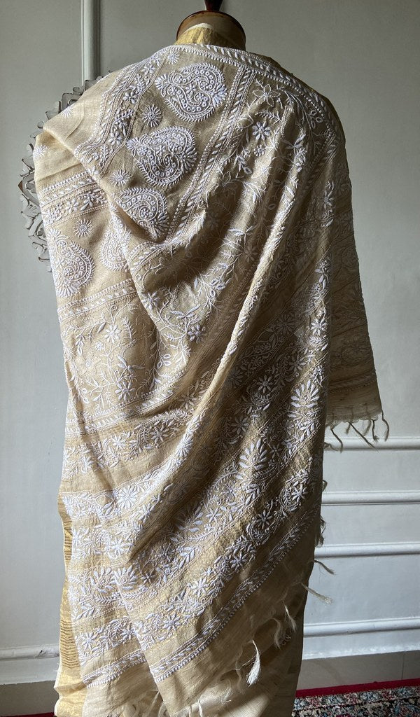 pallu of the gold pure khadi silk saree, do taar and teen taar chikankari with haath ki jaali