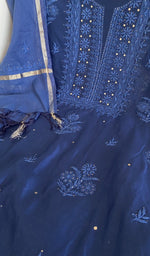 Royal blue chanderi silk laid flat on the table