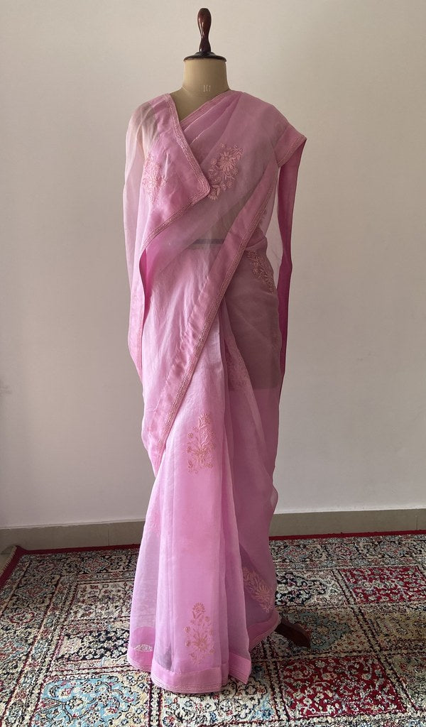 pink pure organza silk chikankari saree draped on the mannequin