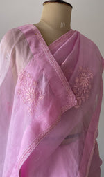 pallu of the pink saree, showing the do taar and teen taar chikankari