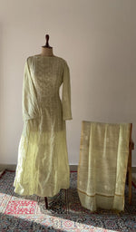The set on the mannequin with its dupatta beside it