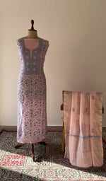 The set on the mannequin with its dupatta beside it