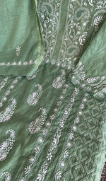 Fine chikankari with haath ki jaali on the sage green linen