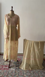 The set on the mannequin with its dupatta beside it