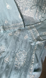 close view of the angarkha style with fine do and teen taar chikankari