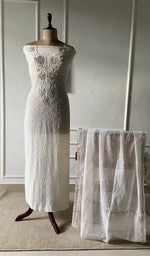 The set on the mannequin with its dupatta beside it