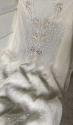 badla work and beadwork across the body of the kurta