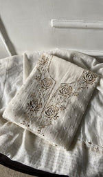 The folded set, kurta on top