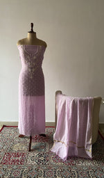 The set on the mannequin with its dupatta beside it