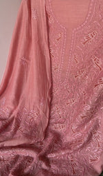 The kurta piece folded on the carpet