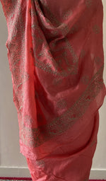 Hand embroidery on the saree, close view