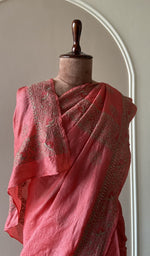 Coral saree on the mannequin, close view
